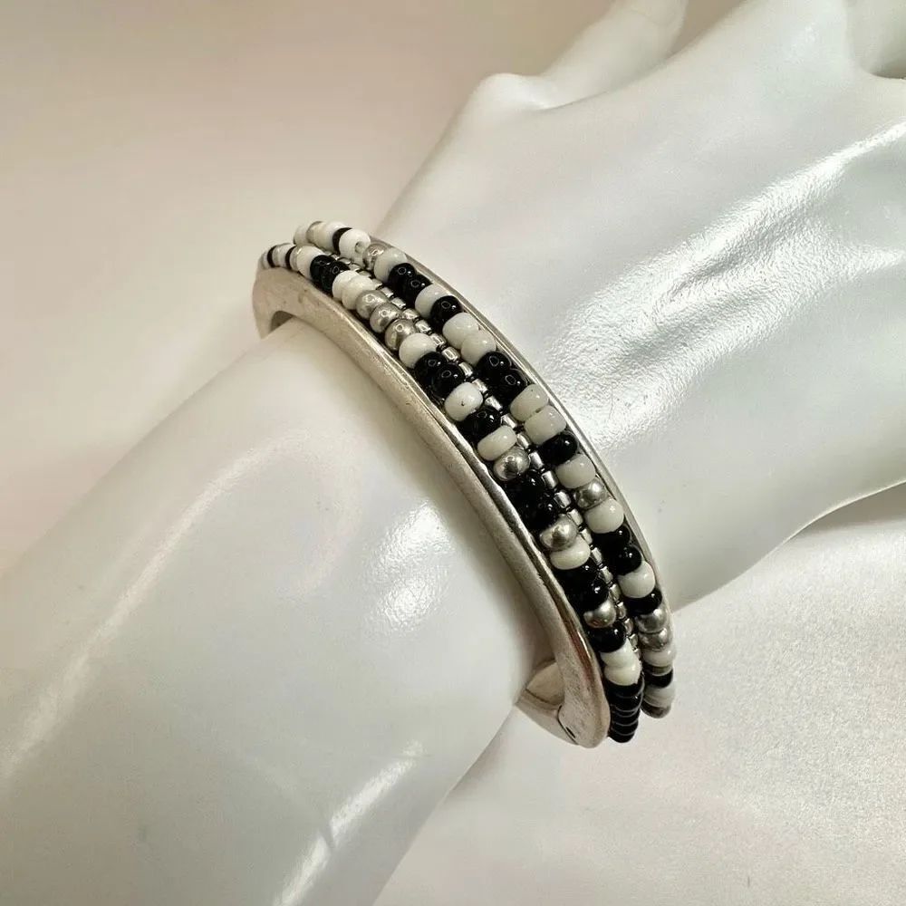 Black and white beaded hinged bangle bracelet